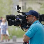 man, staff, employee, glasses, head, filming, professional, outdoors